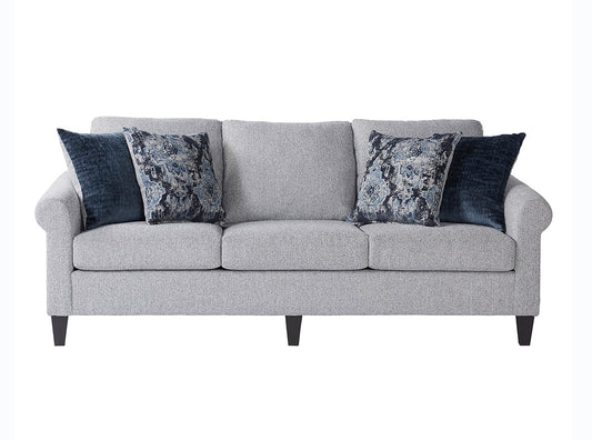 Gray sofa with decorative pillows on a white background