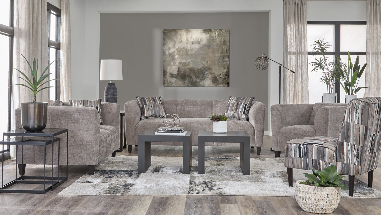 Earth textured sofa and loveseat set with modern curved arms and striped accent pillows