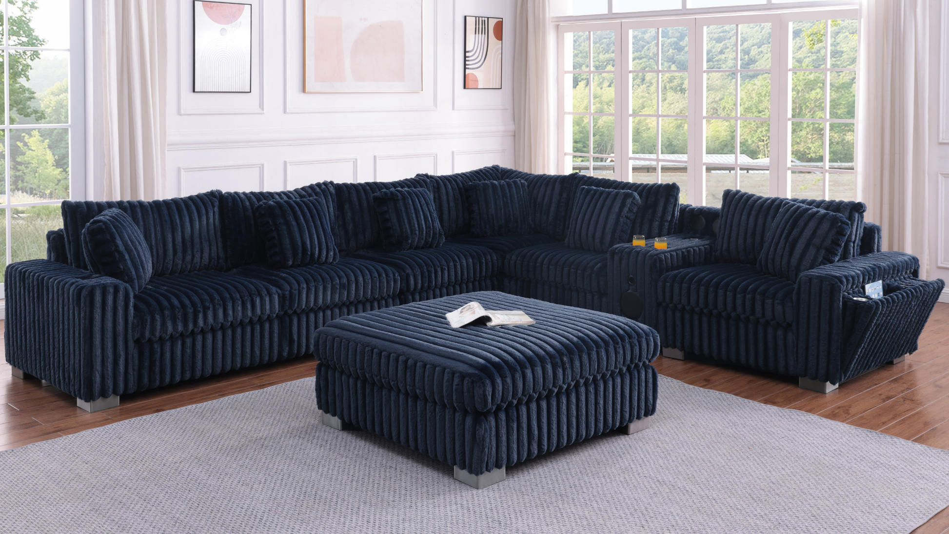 Blue textured sectional sofa with Bluetooth console, cupholders, and ottoman in a living room