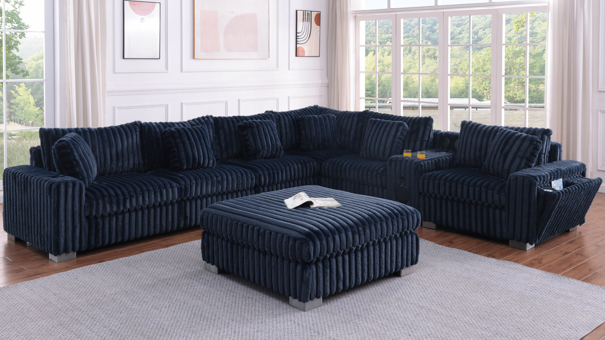 Blue textured sectional sofa with Bluetooth console, cupholders, and ottoman in a living room