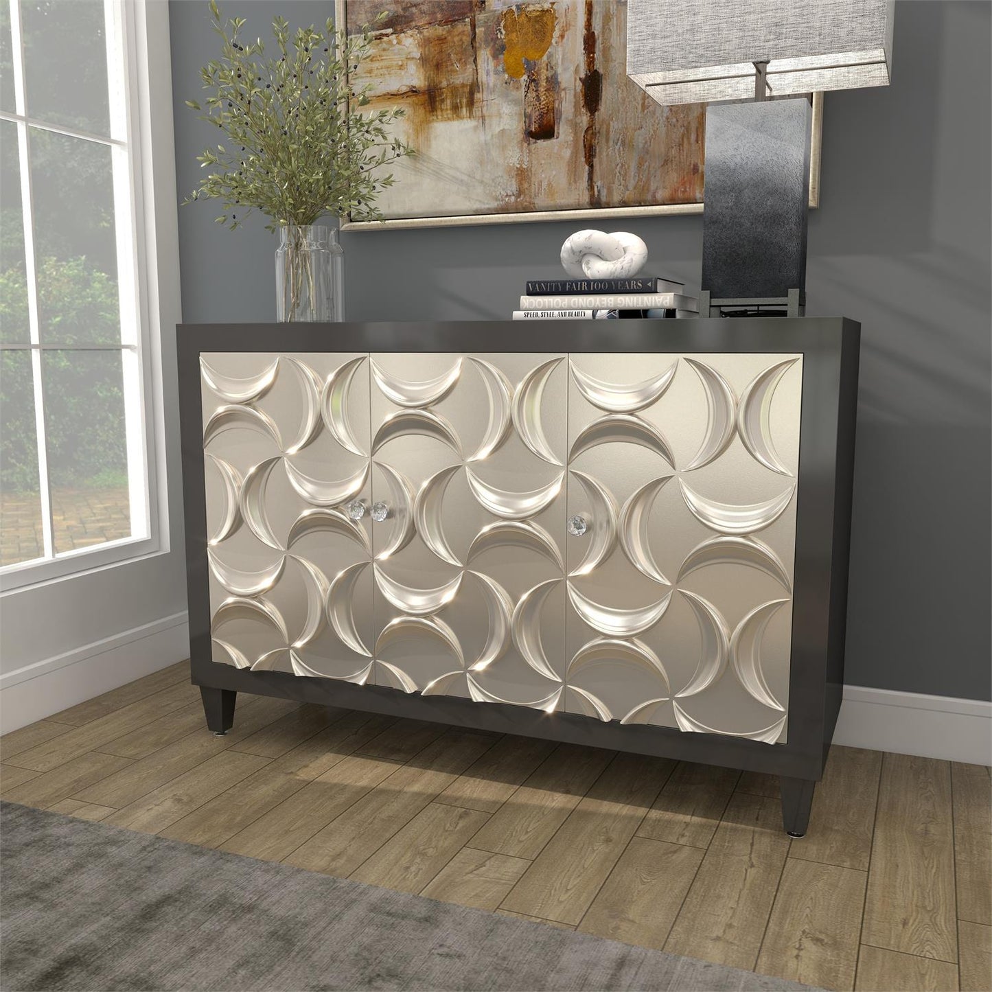 Modern moon-themed cabinet styled in elegant entryway or bedroom setting