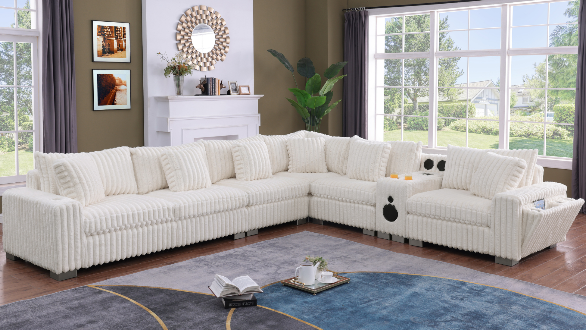 S329 Snuggle Station cream sectional with built-in tech console, Bluetooth speakers, and wireless charging in a living room setting