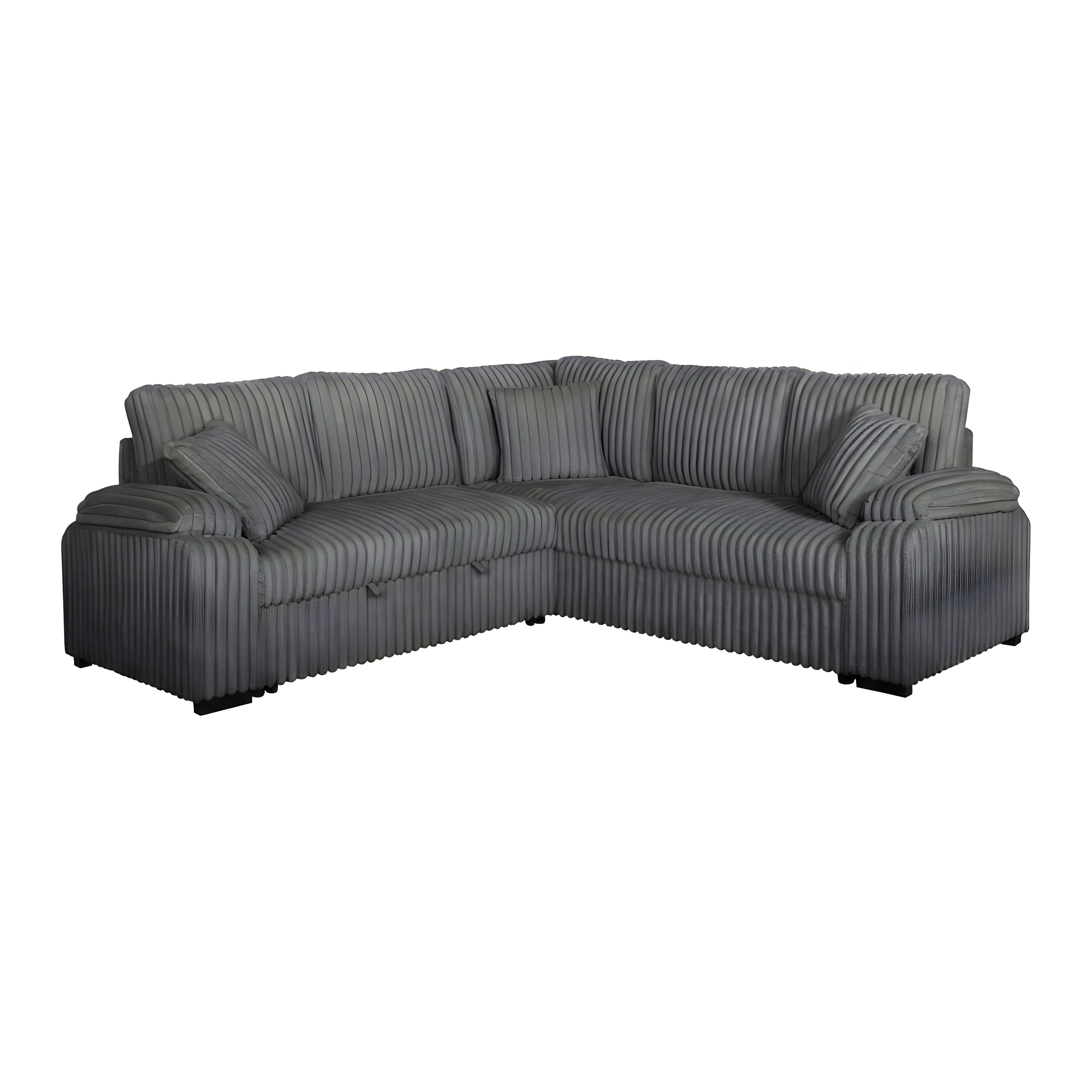 Grey corduroy sectional sofa with pullout bed and matching pillows in a modern living room