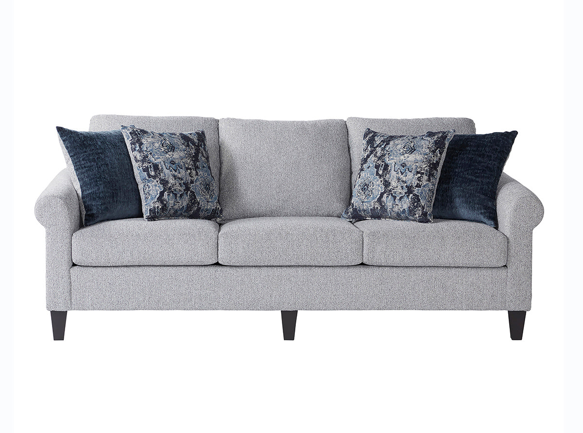Gray sofa with decorative pillows on a white background