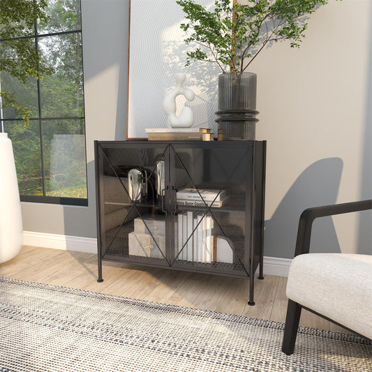 Black glass-door cabinet styled in modern farmhouse entryway with decor accents