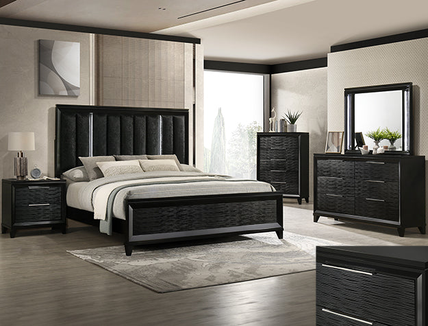 Cressida black dresser with textured wave-front drawers and metallic pulls in a modern bedroom
