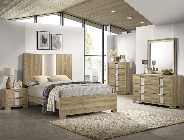 Rangley driftwood finish 5-drawer chest with metallic accents in a modern bedroom