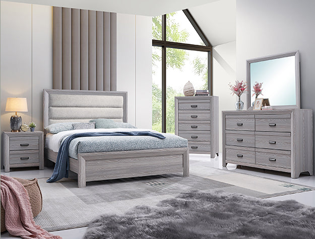 Adelaide driftwood finish 5-drawer chest in a modern bedroom setting