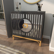Black geometric cabinet styled in a minimalist entryway or modern bedroom