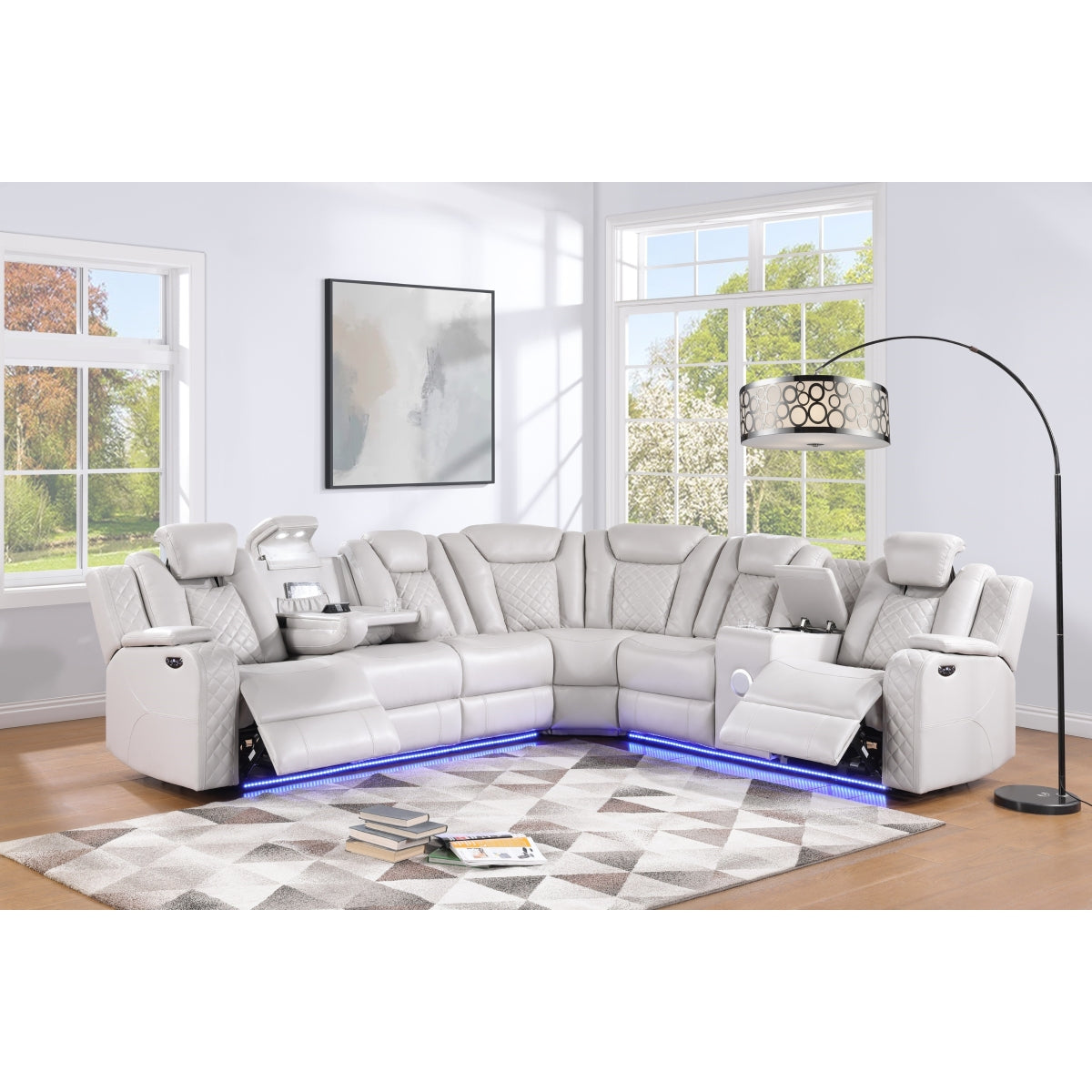 Light gray 3-piece reclining sectional sofa with LED base lighting and console