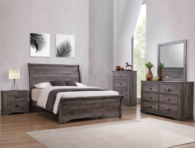 Coralee grey wood sleigh bed with plank-style headboard in a bedroom setting