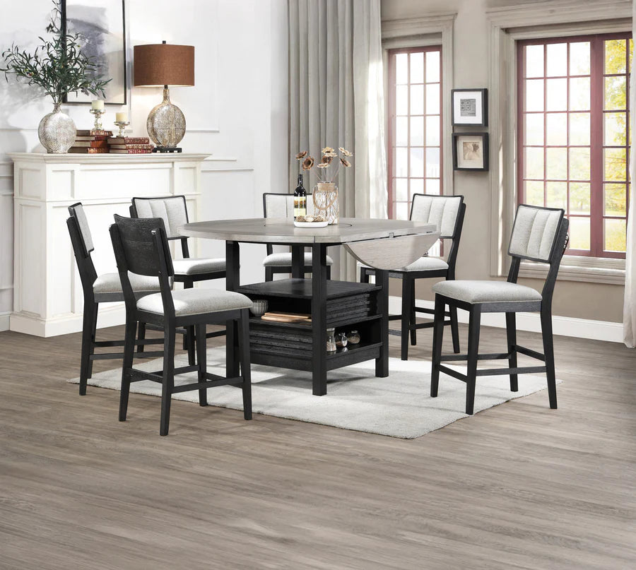 Dining room with a table and chairs in a well-lit room.