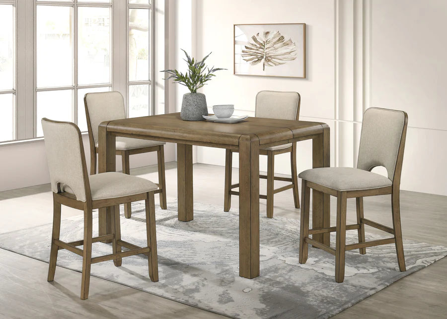 Dining room with wooden table and chairs in a well-lit room.
