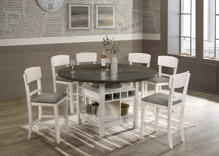 Round dining table with six chairs in a room with a decorative wall and large windows.