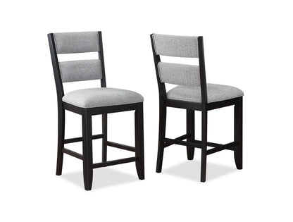 Two bar stools with gray seats and black frames on a white background