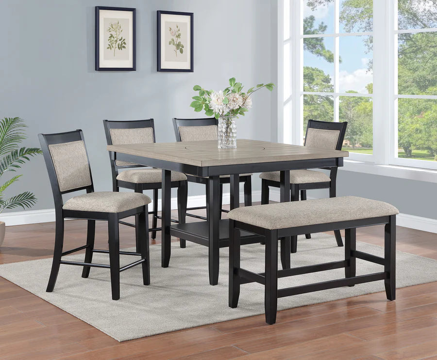Dining room set with table, chairs, and bench in a well-lit room with large windows.