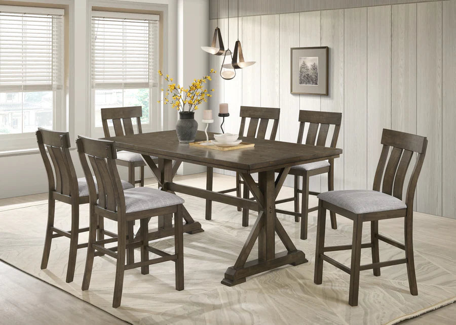 Dining room with a wooden table and chairs in a well-lit room.