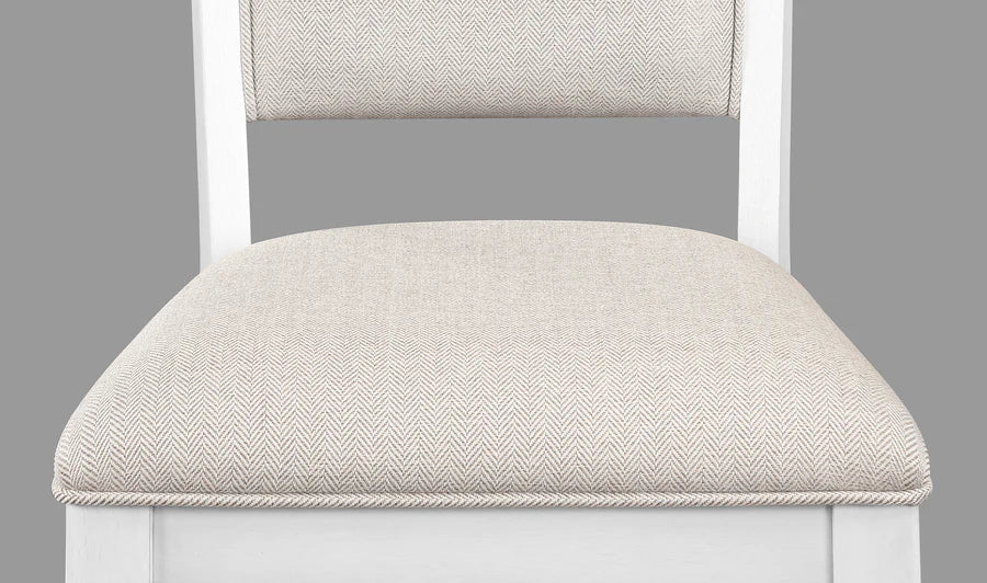 Chair with a beige cushion on a gray background