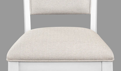 Chair with a beige cushion on a gray background