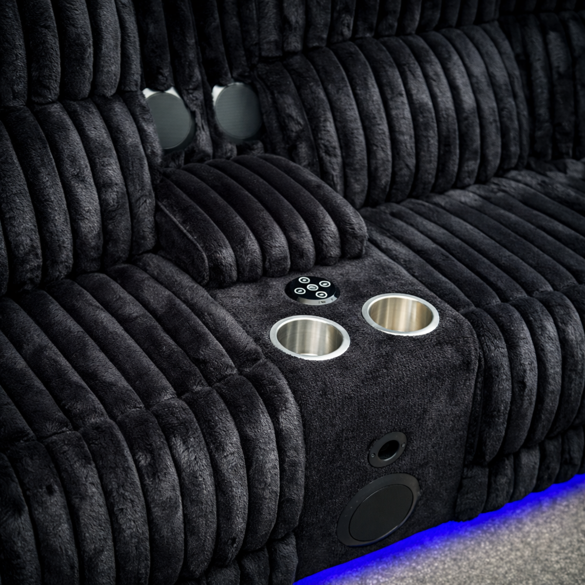 Black corduroy power reclining sectional sofa with LED lighting and built-in speakers