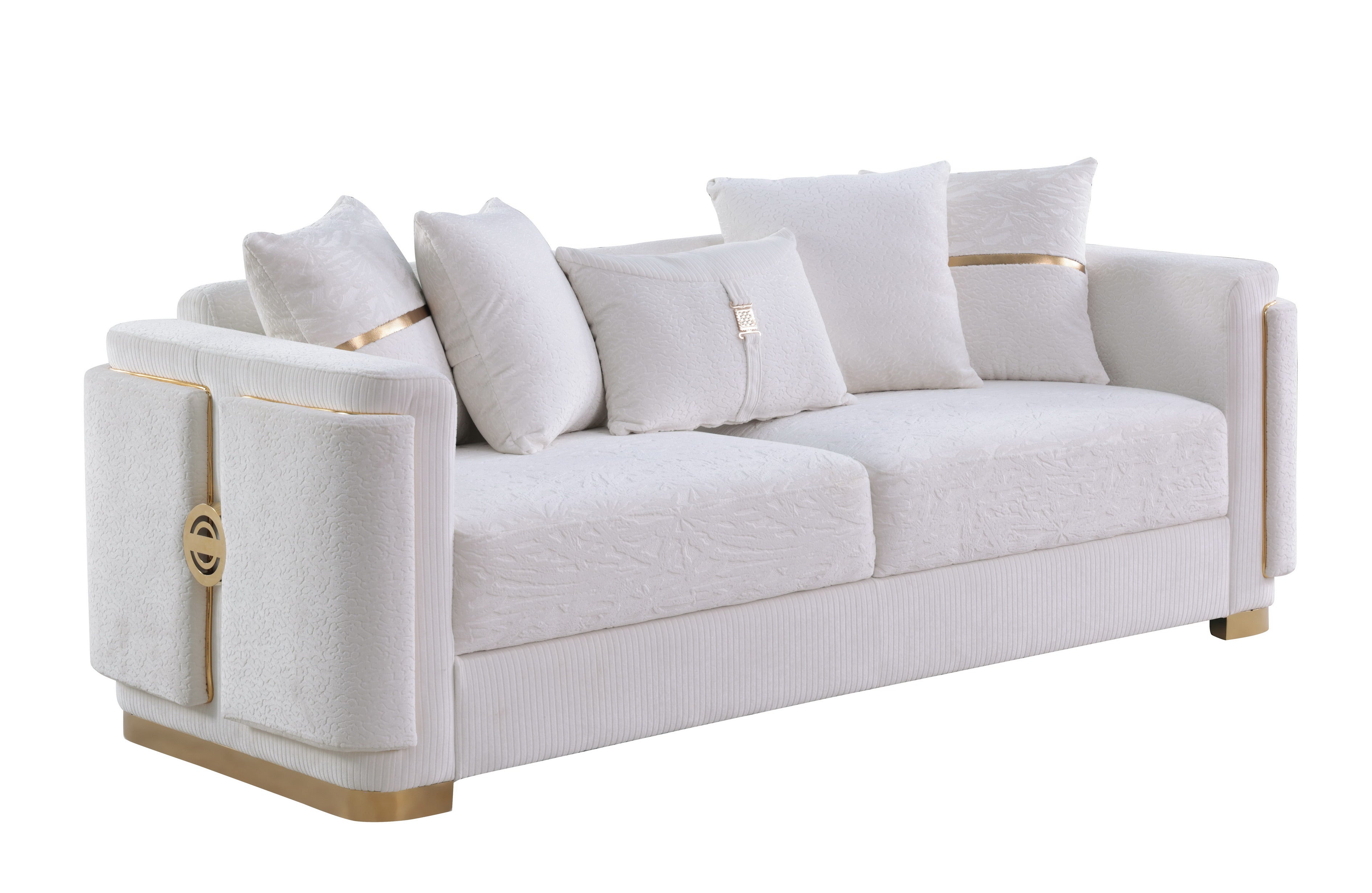 Capri white sofa collection with gold trim and designer pillows in a modern living room