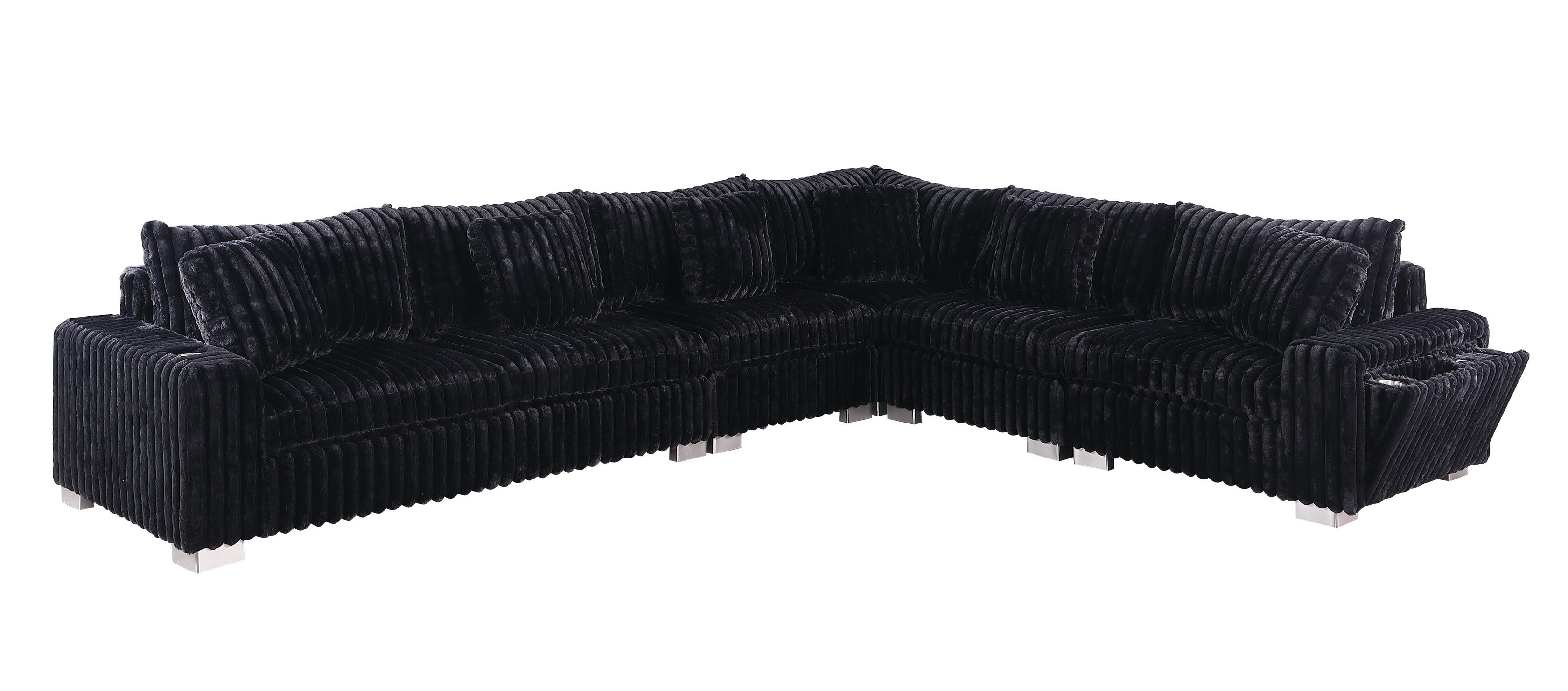 Black textured sectional sofa with Bluetooth console, ottoman, and stainless steel legs in a modern living room