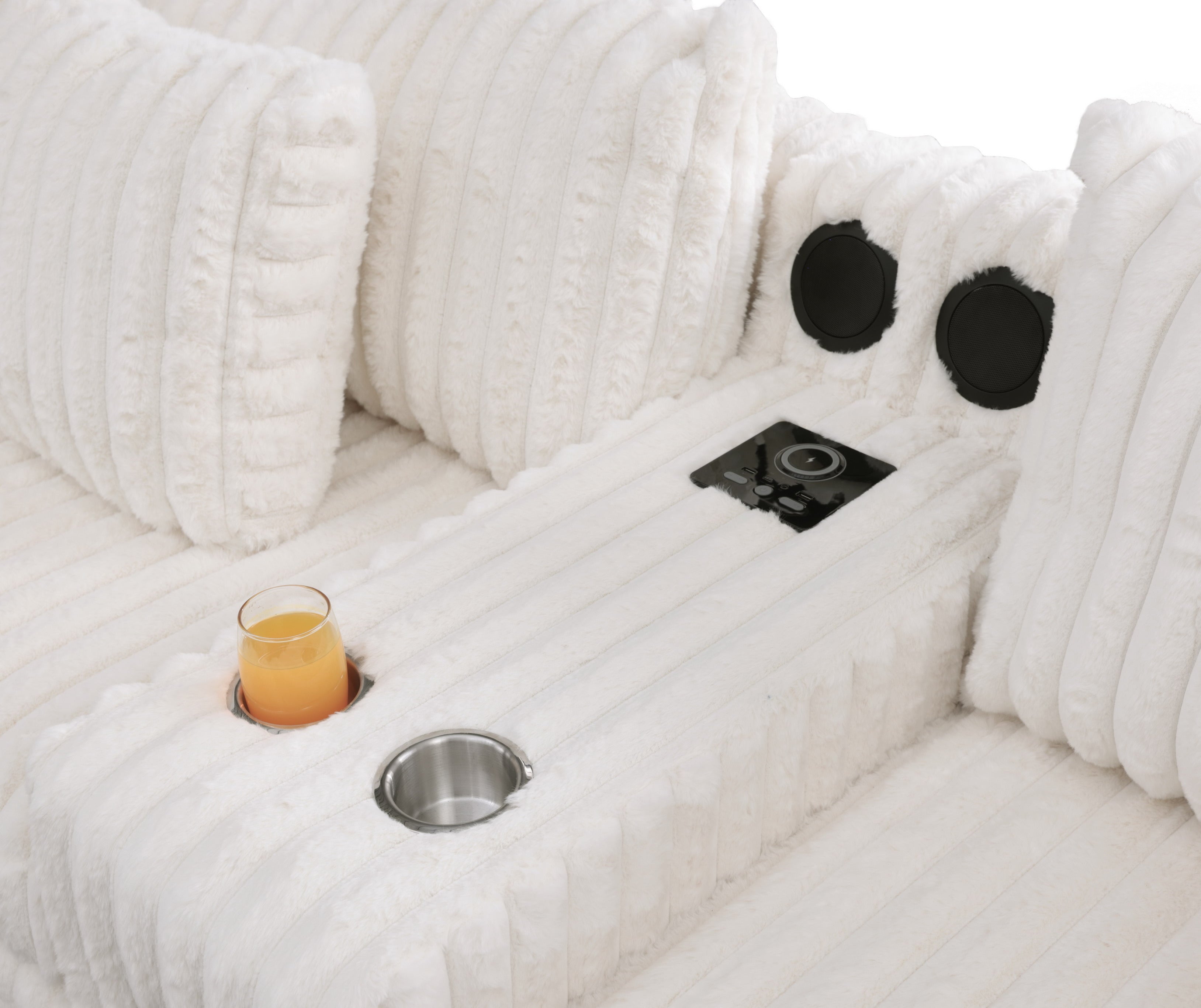 S329 Snuggle Station cream sectional with built-in tech console, Bluetooth speakers, and wireless charging in a living room setting