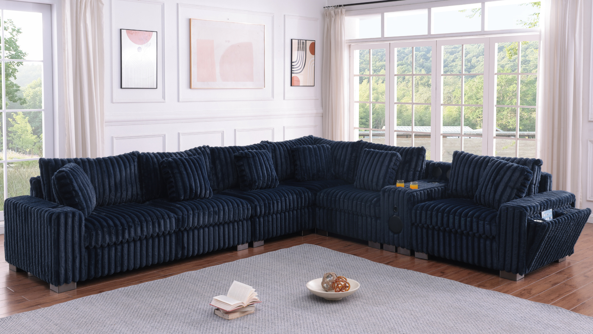 Blue textured sectional sofa with Bluetooth console, cupholders, and ottoman in a living room