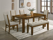 Hollister dining set with wood-tone table, upholstered chairs, and tufted bench