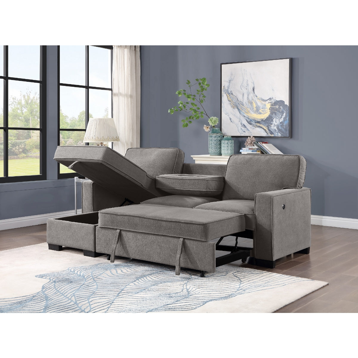 Gray fabric 2-piece sectional sofa with pull-out bed and storage chaise